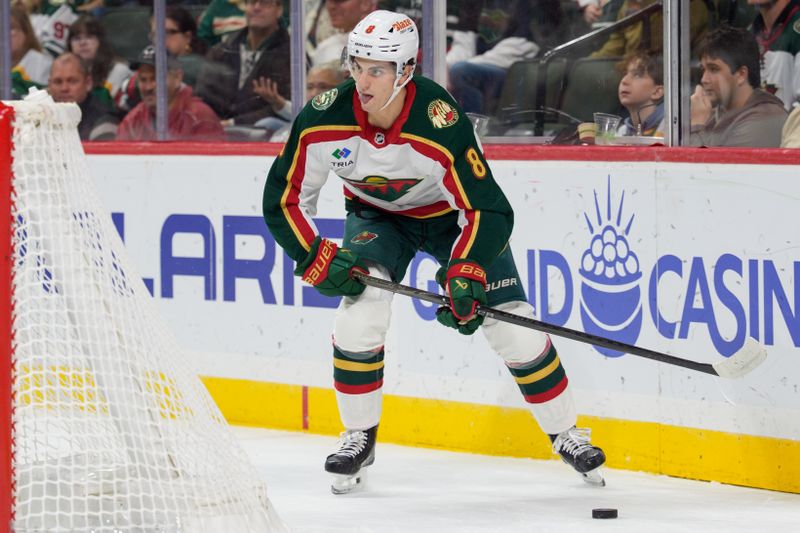 Nov 4, 2025; Saint Paul, Minnesota, USA; Minnesota Wild defenseman Zeev Buium (8) controls the puck behind the Nashville Predators net in the second period at Grand Casino Arena. Mandatory Credit: Matt Blewett-Imagn Images