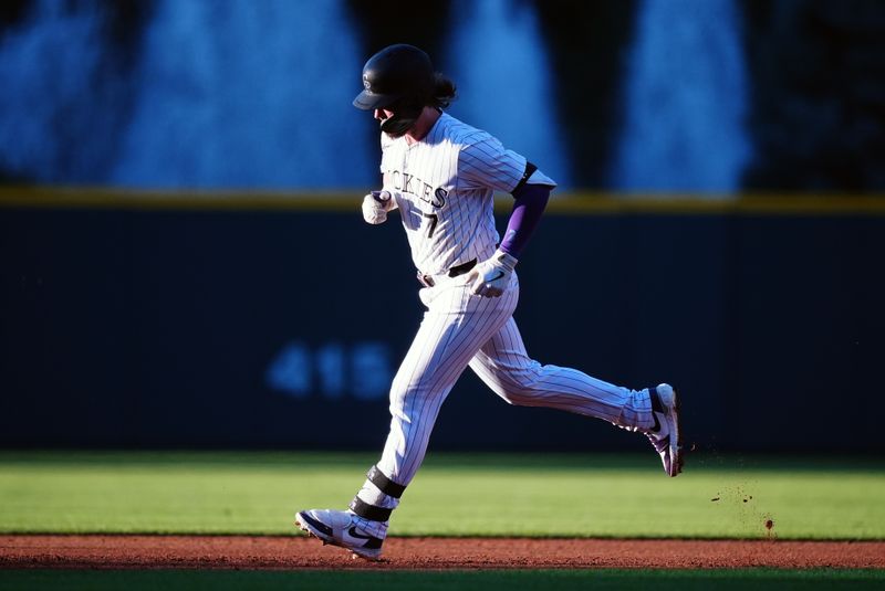 Aug 16, 2024; Denver, Colorado, USA; Colorado Rockies second base Brendan Rodgers (7) runs off a three run home run in the first inning against the San Diego Padres at Coors Field. Mandatory Credit: Ron Chenoy-USA TODAY Sports