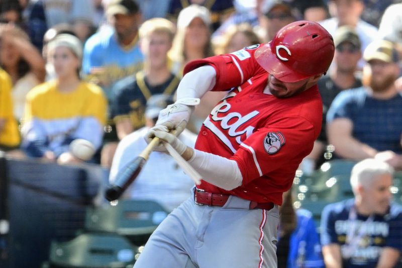 Sep 28, 2025; Milwaukee, Wisconsin, USA;  Cincinnati Reds left fielder Gavin Lux (2) breaks his bat while hitting a single in the first inning against the Milwaukee Brewers at American Family Field. Mandatory Credit: Benny Sieu-Imagn Images