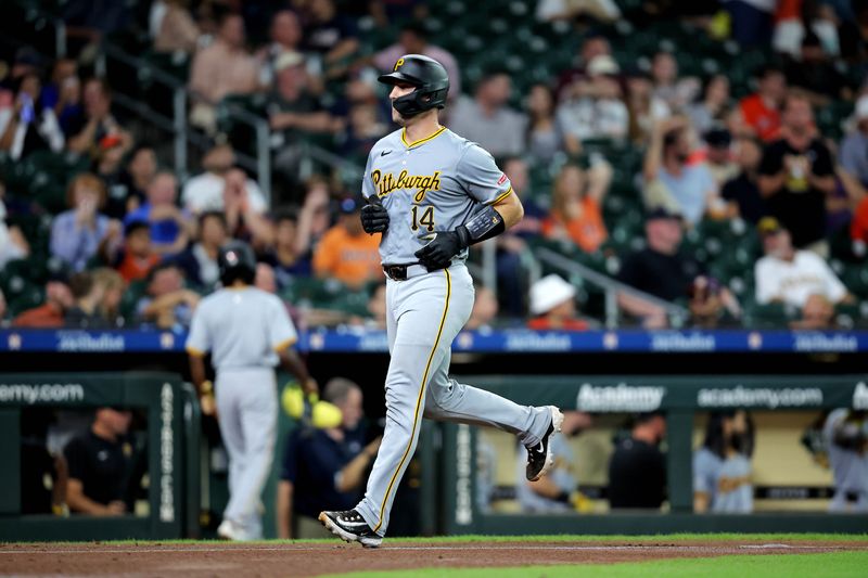 Jul 31, 2024; Houston, Texas, USA; Pittsburgh Pirates catcher Joey Bart (14) crosses home plate after hitting a two-run home run against the Houston Astros during the second inning at Minute Maid Park. Mandatory Credit: Erik Williams-USA TODAY Sports