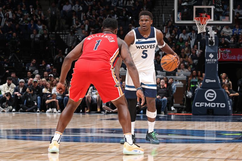 MINNEAPOLIS, MN -  MARCH 19:  Zion Williamson #1 of the New Orleans Pelicans plays defense on Anthony Edwards #5 of the Minnesota Timberwolves during the game between the New Orleans Pelicans and the Minnesota Timberwolves  on March 19, 2025 at Target Center in Minneapolis, Minnesota. NOTE TO USER: User expressly acknowledges and agrees that, by downloading and or using this Photograph, user is consenting to the terms and conditions of the Getty Images License Agreement. Mandatory Copyright Notice: Copyright 2025 NBAE (Photo by David Sherman/NBAE via Getty Images)