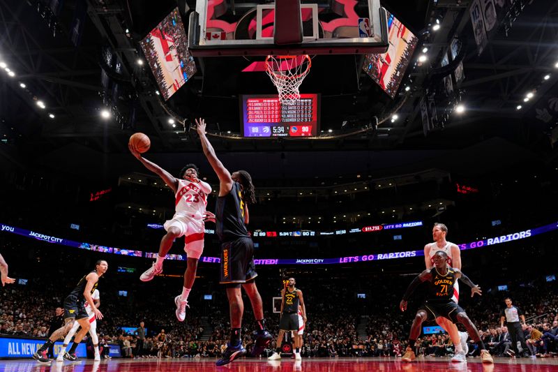 TORONTO, CANADA - JANUARY 13: Jamal Shead #23 of the Toronto Raptors drives to the basket during the game against the Golden State Warriors on January 13, 2025 at the Scotiabank Arena in Toronto, Ontario, Canada.  NOTE TO USER: User expressly acknowledges and agrees that, by downloading and or using this Photograph, user is consenting to the terms and conditions of the Getty Images License Agreement.  Mandatory Copyright Notice: Copyright 2025 NBAE (Photo by Mark Blinch/NBAE via Getty Images)