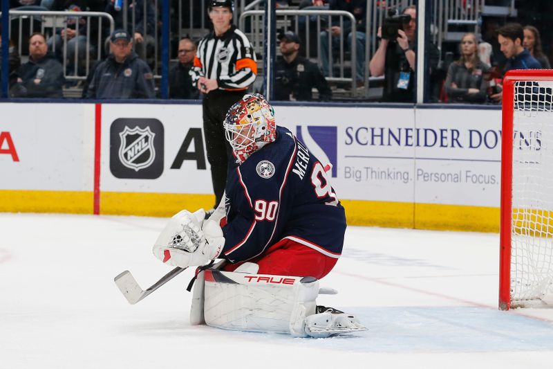 Mar 17, 2024; Columbus, Ohio, USA; Columbus Blue Jackets goalie Elvis Merzlikins (90) makes a save against the Winnipeg Jets during the first period at Nationwide Arena. Mandatory Credit: Russell LaBounty-USA TODAY Sports