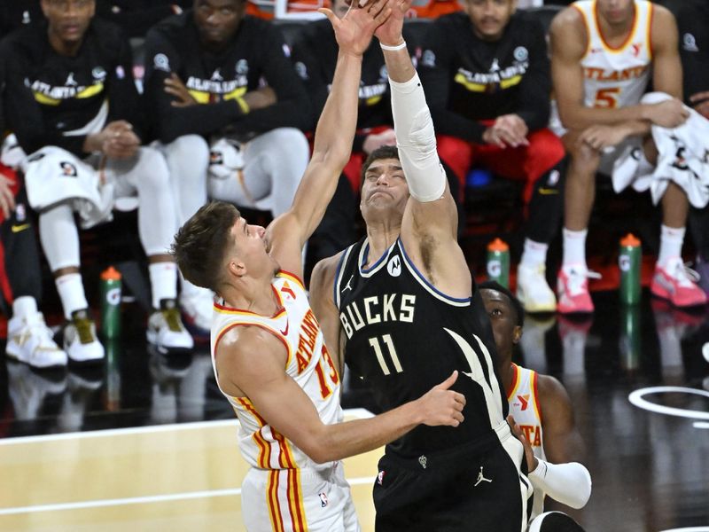 LAS VEGAS, NV - DECEMBER 14: Brook Lopez #11 of the Milwaukee Bucks block during the game against the Atlanta Hawks during the Emirates NBA Cup Semifinal game on December 14, 2024 at T-Mobile Arena in Las Vegas, Nevada. NOTE TO USER: User expressly acknowledges and agrees that, by downloading and/or using this Photograph, user is consenting to the terms and conditions of the Getty Images License Agreement. Mandatory Copyright Notice: Copyright 2024 NBAE (Photo by David Becker/NBAE via Getty Images)