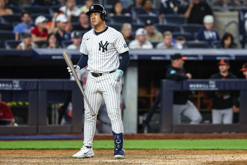 Jun 19, 2024; Bronx, New York, USA;  New York Yankees left fielder Jahmai Jones (14) stands at home plate after being called out on strikes to end the game in the tenth inning against the Baltimore Orioles at Yankee Stadium. Mandatory Credit: Wendell Cruz-USA TODAY Sports