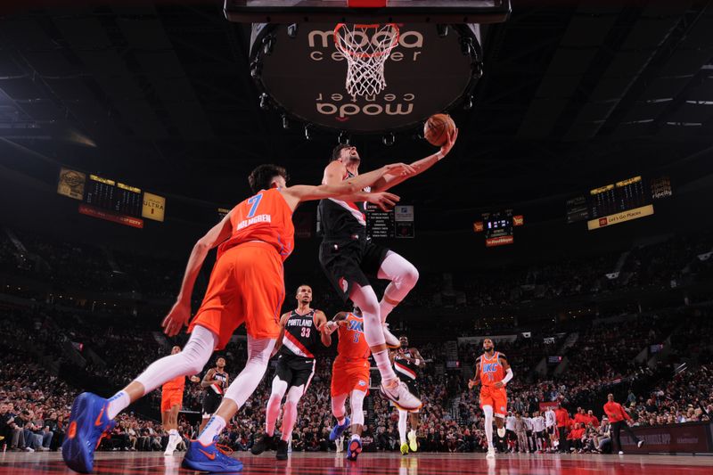 PORTLAND, OR - NOVEMBER 1: Deni Avdija #8 of the Portland Trail Blazers drives to the basket during the game against the Oklahoma City Thunder on November 1, 2024 at the Moda Center Arena in Portland, Oregon. NOTE TO USER: User expressly acknowledges and agrees that, by downloading and or using this photograph, user is consenting to the terms and conditions of the Getty Images License Agreement. Mandatory Copyright Notice: Copyright 2024 NBAE (Photo by Cameron Browne/NBAE via Getty Images)