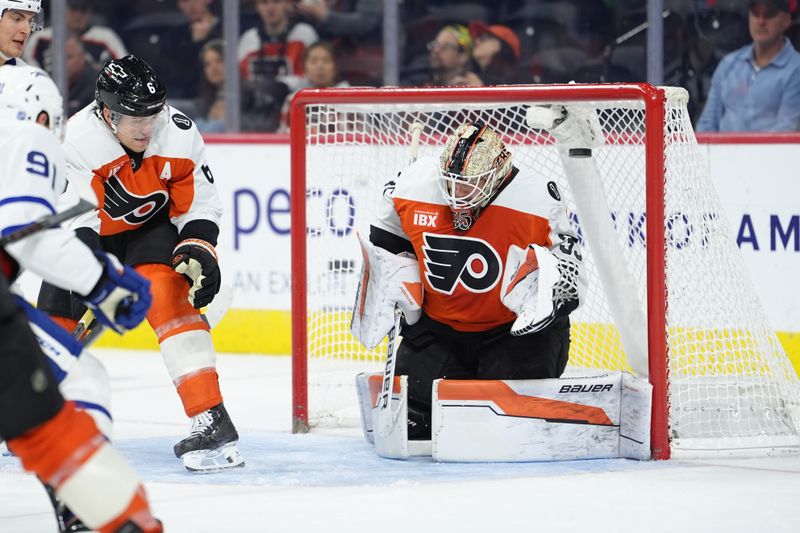Nov 1, 2025; Philadelphia, Pennsylvania, USA; Philadelphia Flyers goalie Aleksei Kolosov (35) makes a save against the Toronto Maple Leafs in the third period at Xfinity Mobile Arena. Mandatory Credit: Kyle Ross-Imagn Images