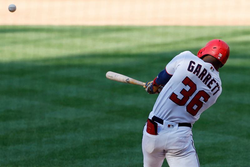 Aug 17, 2023; Washington, District of Columbia, USA; Washington Nationals left fielder Stone Garrett (36) hits an RBI double against the Boston Red Sox during the fifth inning at Nationals Park. Mandatory Credit: Geoff Burke-USA TODAY Sports