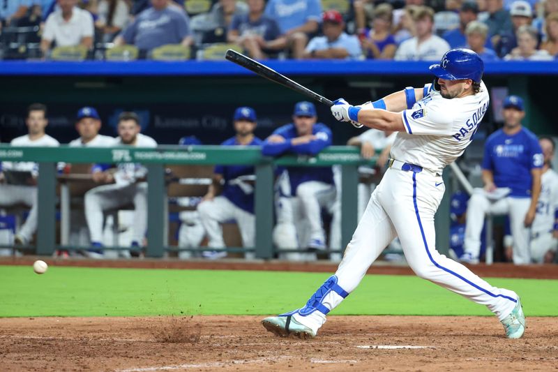 Sep 16, 2025; Kansas City, Missouri, USA; Kansas City Royals first baseman Vinnie Pasquantino (9) has a base hit during the sixth inning against the Seattle Mariners at Kauffman Stadium. Mandatory Credit: Scott Sewell-Imagn Images