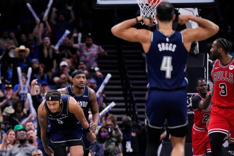 ORLANDO, FLORIDA - APRIL 07: Paolo Banchero #5 of the Orlando Magic celebrates scoring against the Chicago Bulls during the fourth quarter at Kia Center on April 07, 2024 in Orlando, Florida. NOTE TO USER: User expressly acknowledges and agrees that, by downloading and or using this photograph, User is consenting to the terms and conditions of the Getty Images License Agreement. (Photo by Rich Storry/Getty Images)