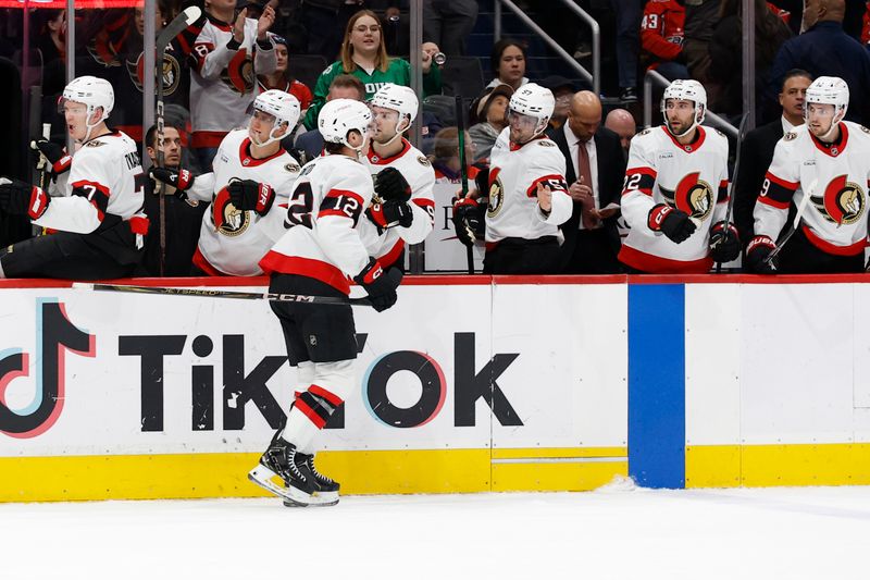 Mar 3, 2025; Washington, District of Columbia, USA; Ottawa Senators center Shane Pinto (12) celebrates with teammates after scoring a goal against the Washington Capitals in the second period at Capital One Arena. Mandatory Credit: Geoff Burke-Imagn Images