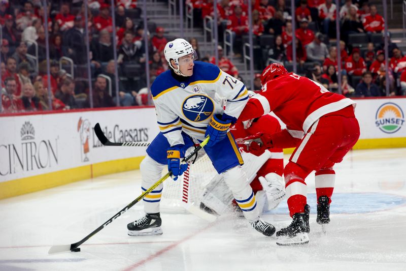 Apr 7, 2024; Detroit, Michigan, USA; Buffalo Sabres right wing Tage Thompson (72) skates with the puck defended by Detroit Red Wings defenseman Ben Chiarot (8) in the first period at Little Caesars Arena. Mandatory Credit: Rick Osentoski-USA TODAY Sports