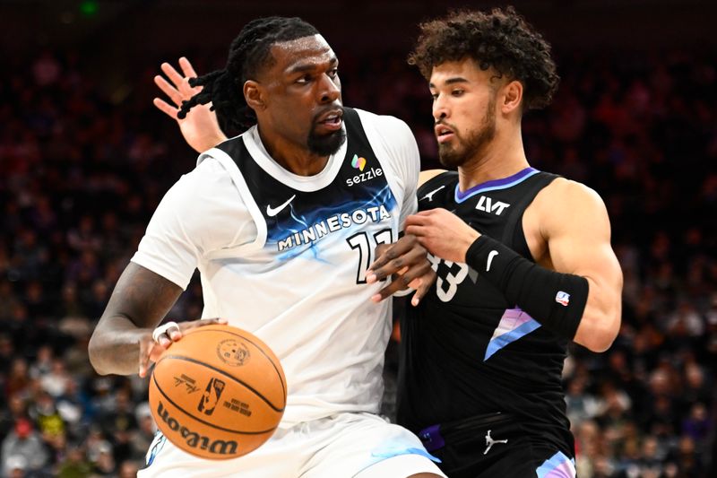 SALT LAKE CITY, UTAH - FEBRUARY 28: Naz Reid #11 of the Minnesota Timberwolves drives into Johnny Juzang #33 of the Utah Jazz during the first half of a game at Delta Center on February 28, 2025 in Salt Lake City, Utah. NOTE TO USER: User expressly acknowledges and agrees that, by downloading and or using this photograph, User is consenting to the terms and conditions of the Getty Images License Agreement. (Photo by Alex Goodlett/Getty Images)