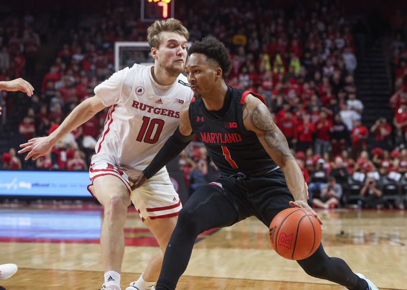 Jan 5, 2023; Piscataway, New Jersey, USA; Maryland Terrapins guard Jahmir Young (1) dribbles against Rutgers Scarlet Knights guard Cam Spencer (10) during the first half at Jersey Mike's Arena. Mandatory Credit: Vincent Carchietta-USA TODAY Sports