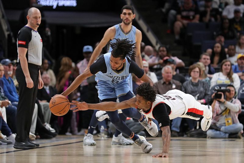 MEMPHIS, TENNESSEE - MARCH 02: Ziaire Williams #8 of the Memphis Grizzlies and Ashton Hagans #19 of the Portland Trail Blazers fight for the ball during the second half at FedExForum on March 02, 2024 in Memphis, Tennessee. NOTE TO USER: User expressly acknowledges and agrees that, by downloading and or using this photograph, User is consenting to the terms and conditions of the Getty Images License Agreement. (Photo by Justin Ford/Getty Images)