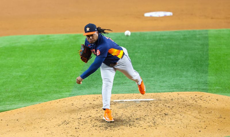 Aug 6, 2024; Arlington, Texas, USA;  Houston Astros starting pitcher Framber Valdez (59) throws during the fourth inning against the Texas Rangers at Globe Life Field. Mandatory Credit: Kevin Jairaj-USA TODAY Sports