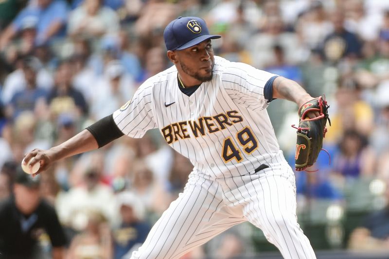 Jun 10, 2023; Milwaukee, Wisconsin, USA; Milwaukee Brewers pitcher Julio Teheran (49) pitches against the Oakland Athletes in the first inning at American Family Field. Mandatory Credit: Benny Sieu-USA TODAY Sports