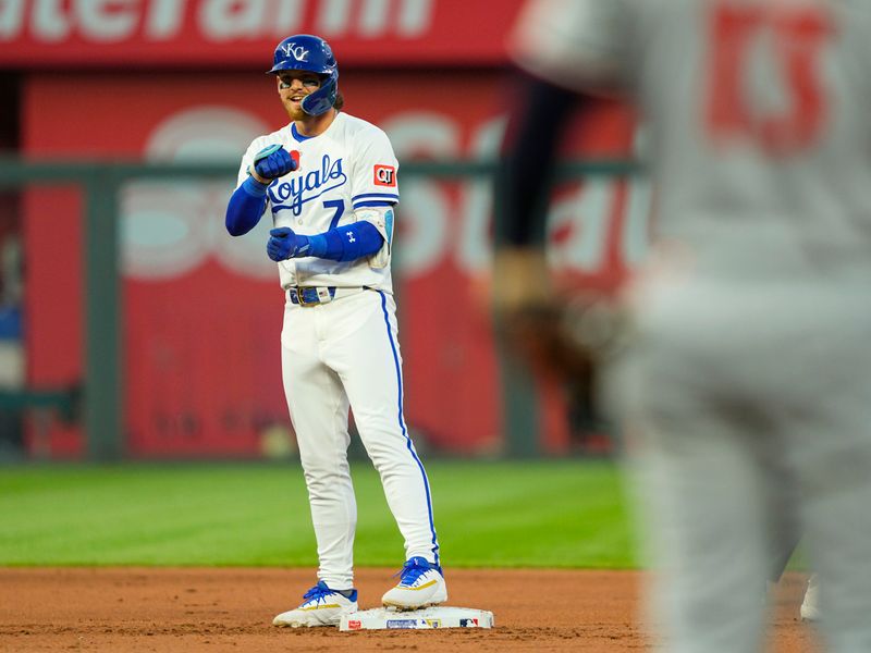 Apr 9, 2025; Kansas City, Missouri, USA; Kansas City Royals shortstop Bobby Witt Jr. (7) reacts after hitting a double during the fourth inning against the Minnesota Twins at Kauffman Stadium. Mandatory Credit: Jay Biggerstaff-Imagn Images
