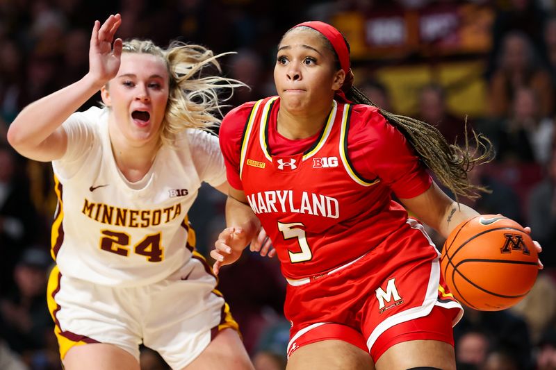 Jan 3, 2024; Minneapolis, Minnesota, USA; Maryland Terrapins guard Brinae Alexander (5) works around Minnesota Golden Gophers forward Mallory Heyer (24)  during the second half at Williams Arena. Mandatory Credit: Matt Krohn-USA TODAY Sports