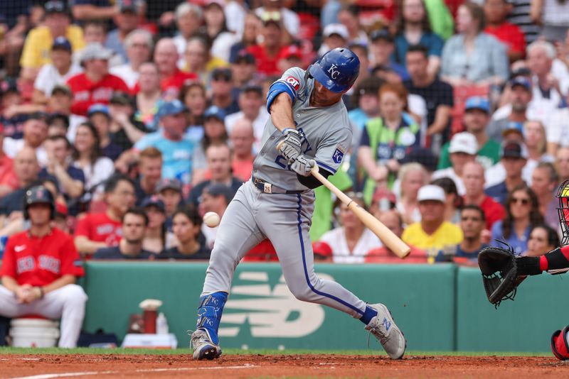 Jul 12, 2024; Boston, Massachusetts, USA; Kansas City Royals designated hitter Adam Frazier (26) hits an RBI single during the second inning against the Boston Red Sox at Fenway Park. Mandatory Credit: Paul Rutherford-USA TODAY Sports