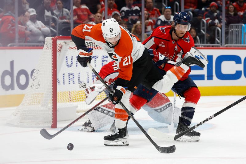 Oct 23, 2024; Washington, District of Columbia, USA; Philadelphia Flyers center Scott Laughton (21) and Washington Capitals defenseman Jakob Chychrun (6) battle for the puck in front of Capitals goaltender Logan Thompson (48) at Capital One Arena. Mandatory Credit: Geoff Burke-Imagn Images