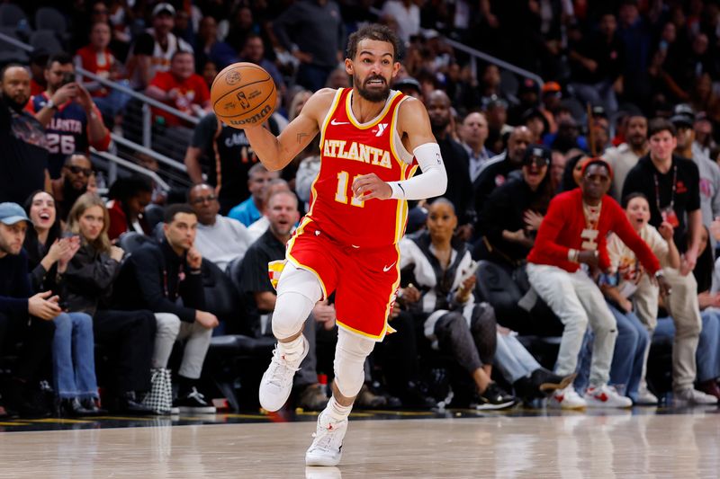 ATLANTA, GEORGIA - NOVEMBER 6: Trae Young #11 of the Atlanta Hawks drives down the court during the fourth quarter against the New York Knicks at State Farm Arena on November 6, 2024 in Atlanta, Georgia. NOTE TO USER: User expressly acknowledges and agrees that, by downloading and or using this photograph, User is consenting to the terms and conditions of the Getty Images License Agreement. (Photo by Todd Kirkland/Getty Images)