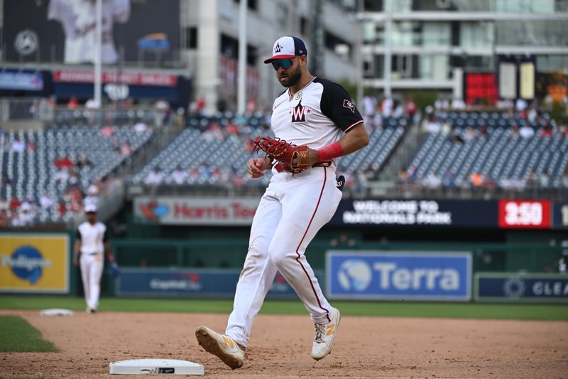 Sep 15, 2024; Washington, District of Columbia, USA; Washington Nationals first baseman Joey Gallo (24) tags 1st base after fielding a ground ball against the Miami Marlins during the ninth inning at Nationals Park. Mandatory Credit: Rafael Suanes-Imagn Images