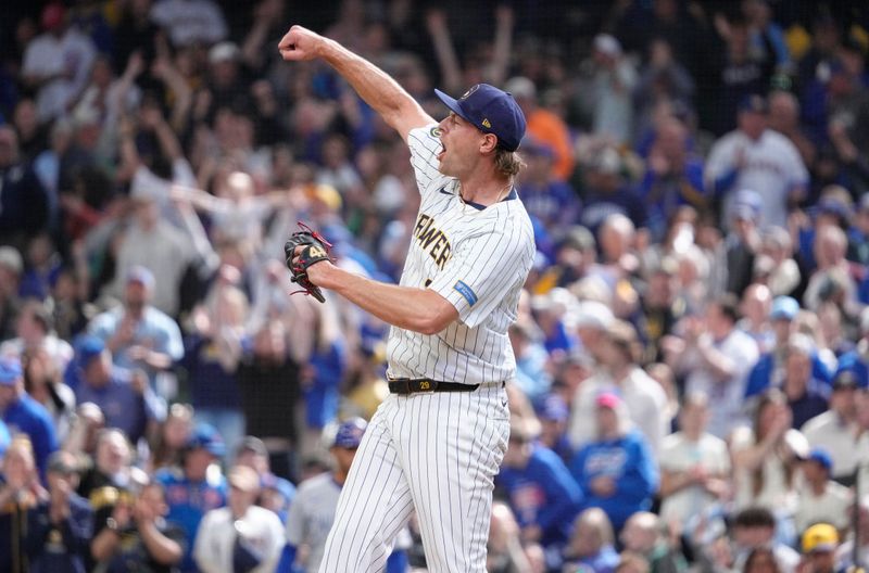 May 4, 2025; Milwaukee, Wisconsin, USA; Milwaukee Brewers pitcher Trevor Megill (29) celebrates a 4-0 win over the Chicago Cubs in the ninth inning at American Family Field. Mandatory Credit: Michael McLoone-Imagn Images