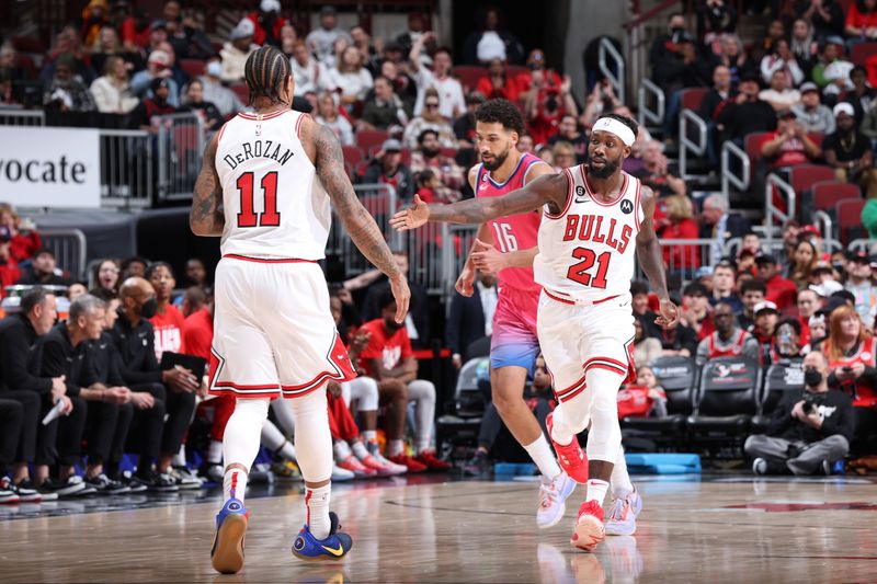 CHICAGO, IL - FEBRUARY 26: DeMar DeRozan #11 and Patrick Beverley #21 of the Chicago Bulls celebrate during the game against the Washington Wizards on February 26, 2023 at United Center in Chicago, Illinois. NOTE TO USER: User expressly acknowledges and agrees that, by downloading and or using this photograph, User is consenting to the terms and conditions of the Getty Images License Agreement. Mandatory Copyright Notice: Copyright 2023 NBAE (Photo by Jeff Haynes/NBAE via Getty Images)