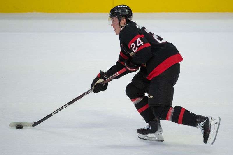 Nov 2, 2023; Ottawa, Ontario, CAN; Ottawa Senators defenseman Jacob Bernard-Docker (24) skates with the puck in the third period against the Los Angeles Kings at the Canadian Tire Centre. Mandatory Credit: Marc DesRosiers-USA TODAY Sports