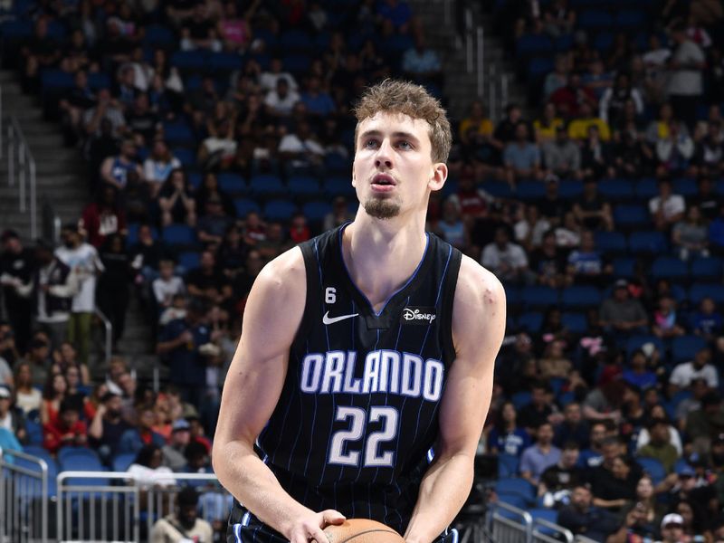 ORLANDO, FL - FEBRUARY 11: Franz Wagner #22 of the Orlando Magic prepares to shoot a free throw during the game against the Miami Heat on February 11, 2023 at Amway Center in Orlando, Florida. NOTE TO USER: User expressly acknowledges and agrees that, by downloading and or using this photograph, User is consenting to the terms and conditions of the Getty Images License Agreement. Mandatory Copyright Notice: Copyright 2023 NBAE (Photo by Fernando Medina/NBAE via Getty Images)