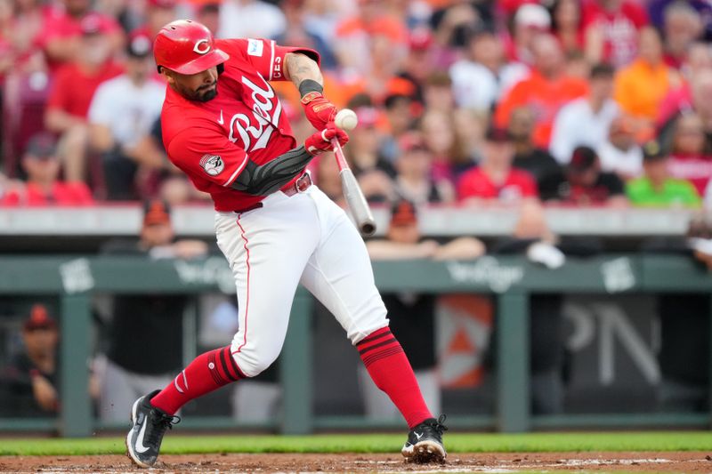 May 4, 2024; Cincinnati, Ohio, USA; Cincinnati Reds first base Christian Encarnacion-Strand (33) hits a single to shallow right field in the second inning of a baseball game against the Baltimore Orioles at Great American Ball Park. Mandatory Credit: The Cincinnati Enquirer-USA TODAY Sports