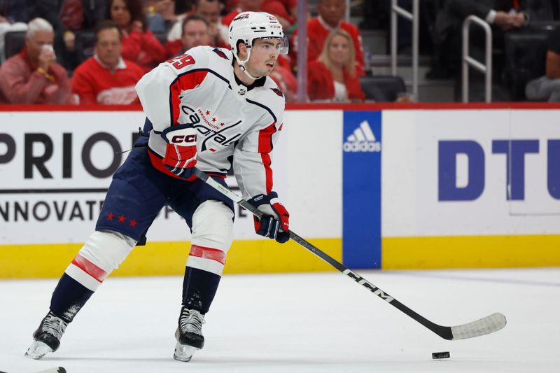 Apr 9, 2024; Detroit, Michigan, USA; Washington Capitals center Hendrix Lapierre (29) skates with the puck in the first period against the Detroit Red Wings at Little Caesars Arena. Mandatory Credit: Rick Osentoski-USA TODAY Sports