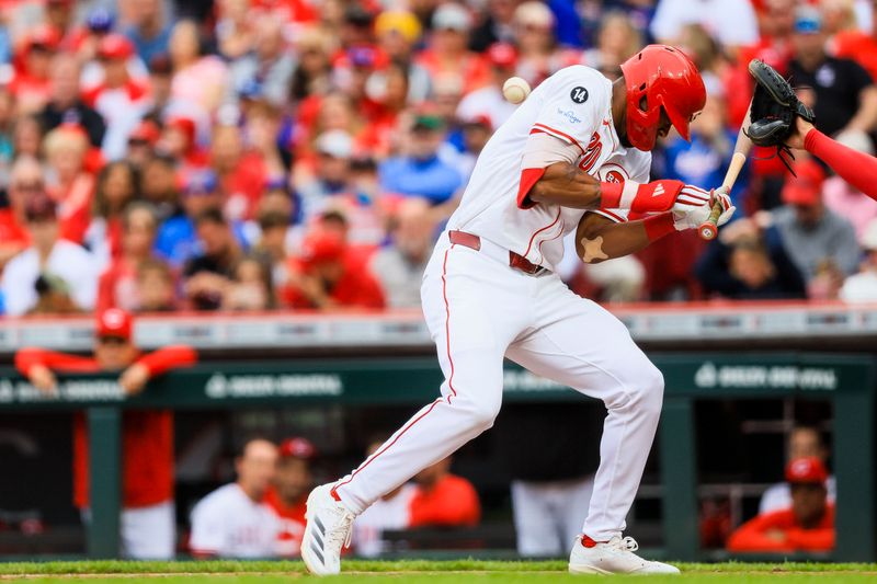 May 25, 2025; Cincinnati, Ohio, USA; Cincinnati Reds outfielder Will Benson (30) dodges a pitch in the fifth inning against the Chicago Cubs at Great American Ball Park. Mandatory Credit: Katie Stratman-Imagn Images