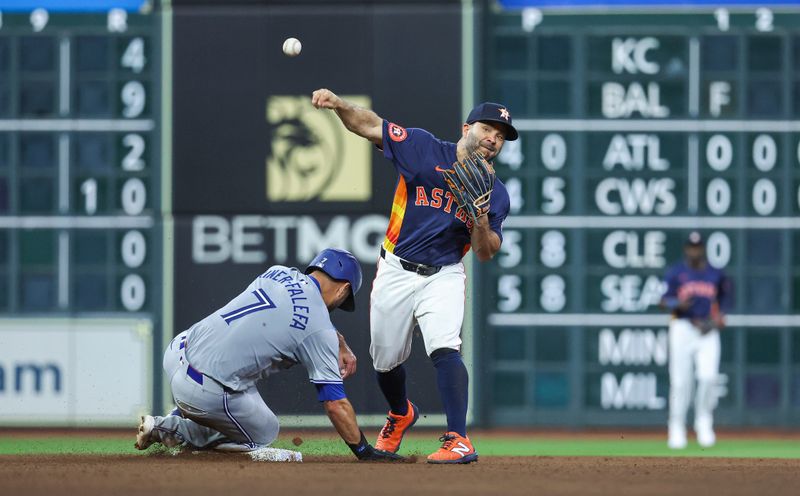 Apr 2, 2024; Houston, Texas, USA; Toronto Blue Jays third baseman Isiah Kiner-Falefa (7) is out as Houston Astros second baseman Jose Altuve (27) throws to first base during the eighth inning at Minute Maid Park. Mandatory Credit: Troy Taormina-USA TODAY Sports