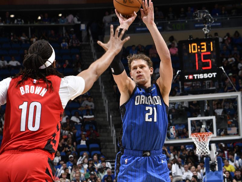 ORLANDO, FL - APRIL 1: Moritz Wagner #21 of the Orlando Magic shoots the ball during the game against the Portland Trail Blazers on April 1, 2024 at Kia Center in Orlando, Florida. NOTE TO USER: User expressly acknowledges and agrees that, by downloading and or using this photograph, User is consenting to the terms and conditions of the Getty Images License Agreement. Mandatory Copyright Notice: Copyright 2024 NBAE (Photo by Fernando Medina/NBAE via Getty Images)