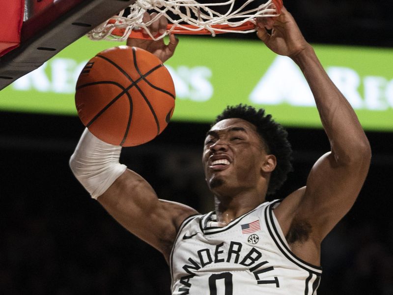 Feb 18, 2023; Nashville, Tennessee, USA;   Vanderbilt Commodores guard Tyrin Lawrence (0) dunks against Auburn Tigers during the second half at Memorial Gymnasium.  Mandatory Credit: George Walker IV - USA TODAY Sports