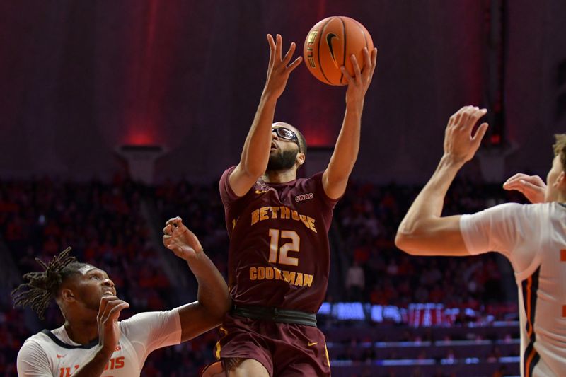 Dec 29, 2022; Champaign, Illinois, USA;  Bethune-Cookman Wildcats guard Kevin Davis (12) drives to the basket during the second half against the Illinois Fighting Illiniat State Farm Center. Mandatory Credit: Ron Johnson-USA TODAY Sports