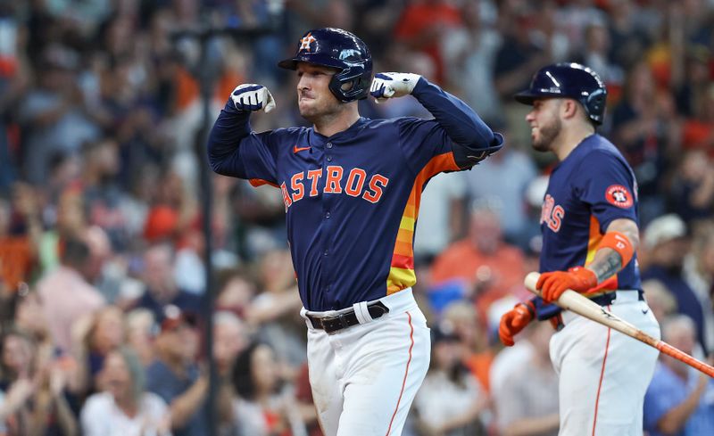 Sep 22, 2024; Houston, Texas, USA; Houston Astros third baseman Alex Bregman (2) celebrates after hitting a home run during the fifth inning against the Los Angeles Angels at Minute Maid Park. Mandatory Credit: Troy Taormina-Imagn Images