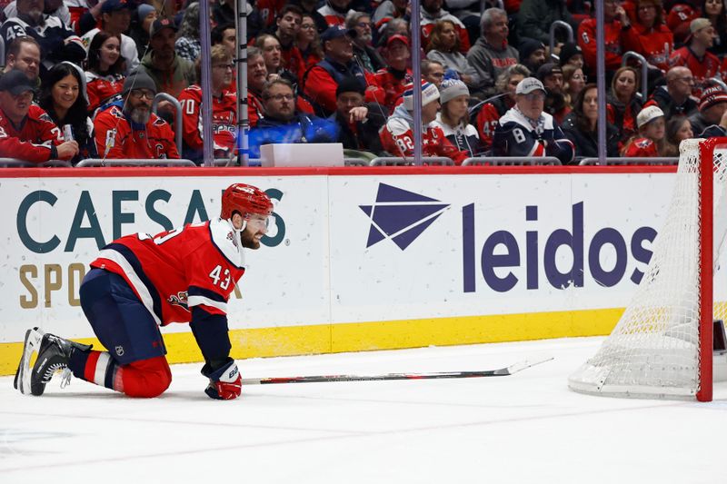 Jan 3, 2026; Washington, District of Columbia, USA; Washington Capitals right wing Tom Wilson (43) kneels on the ice after being injured against the Chicago Blackhawks during the first period at Capital One Arena. Mandatory Credit: Geoff Burke-Imagn Images