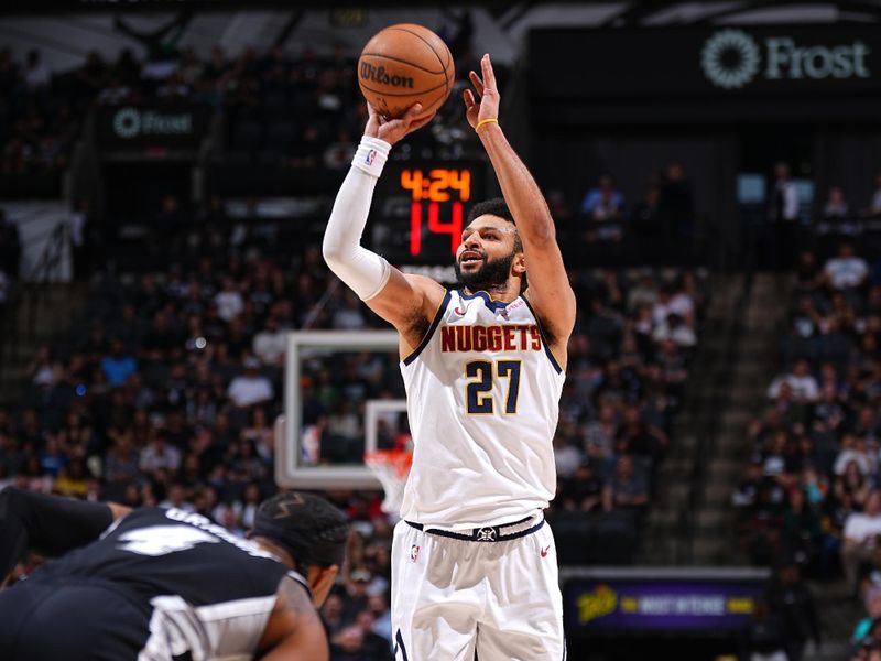 SAN ANTONIO, TX - APRIL 12: Jamal Murray #27 of the Denver Nuggets shoots a three point basket during the game against the San Antonio Spurs on April 12, 2024 at the Frost Bank Center in San Antonio, Texas. NOTE TO USER: User expressly acknowledges and agrees that, by downloading and or using this photograph, user is consenting to the terms and conditions of the Getty Images License Agreement. Mandatory Copyright Notice: Copyright 2024 NBAE (Photos by Garrett Ellwood/NBAE via Getty Images)