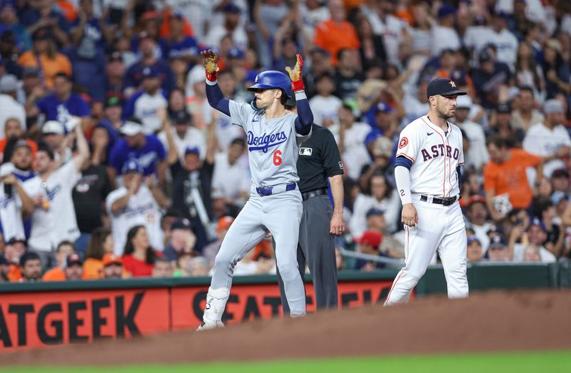 Jul 27, 2024; Houston, Texas, USA; Los Angeles Dodgers first baseman Cavan Biggio (6) celebrates after hitting an RBI triple during the second inning against the Houston Astros at Minute Maid Park. Mandatory Credit: Troy Taormina-USA TODAY Sports
