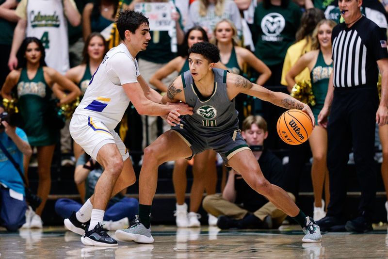 Feb 9, 2024; Fort Collins, Colorado, USA; Colorado State Rams guard Nique Clifford (10) controls the ball as San Jose State Spartans guard Alvaro Cardenas (13) guards in the first half at Moby Arena. Mandatory Credit: Isaiah J. Downing-USA TODAY Sports