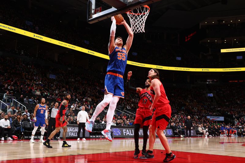 TORONTO, CANADA - MARCH 27: Isaiah Hartenstein #55 of the New York Knicks dunks the ball during the game against the Toronto Raptors on March 27, 2024 at the Scotiabank Arena in Toronto, Ontario, Canada.  NOTE TO USER: User expressly acknowledges and agrees that, by downloading and or using this Photograph, user is consenting to the terms and conditions of the Getty Images License Agreement.  Mandatory Copyright Notice: Copyright 2024 NBAE (Photo by Vaughn Ridley/NBAE via Getty Images)