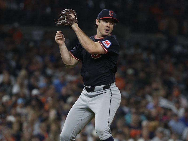 Sep 17, 2025; Detroit, Michigan, USA; Cleveland Guardians relief pitcher Matt Festa (52) catches a ball hit by Detroit Tigers catcher Dillon Dingler (not pictured) during the seventh inning at Comerica Park. Mandatory Credit: Brian Bradshaw Sevald-Imagn Images