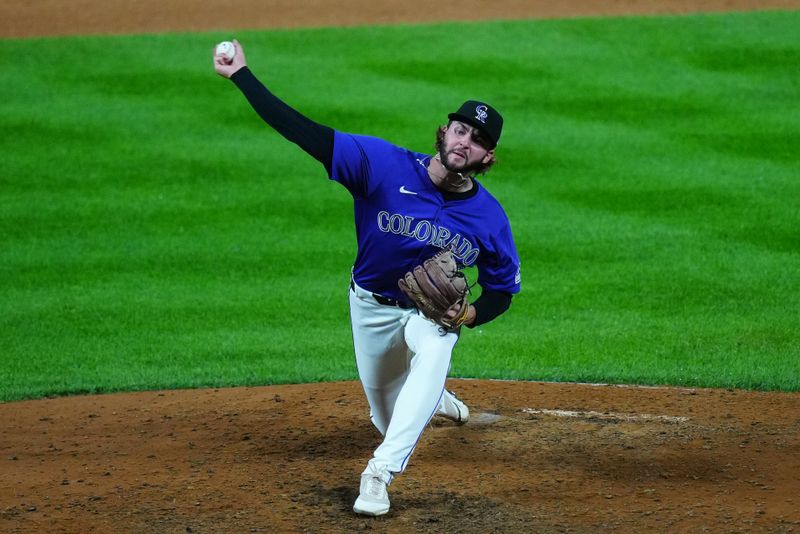 Aug 28, 2024; Denver, Colorado, USA; Colorado Rockies pitcher Anthony Molina (43) delivers a pitch in the ninth inning against the Miami Marlins at Coors Field. Mandatory Credit: Ron Chenoy-USA TODAY Sports