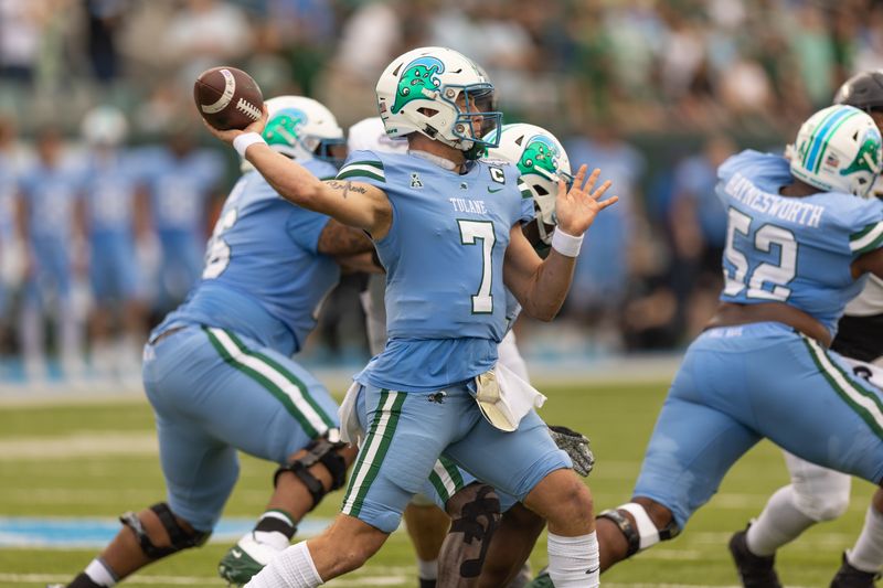 Dec 3, 2022; New Orleans, Louisiana, USA; Tulane Green Wave quarterback Michael Pratt (7) passes the ball against the UCF Knights  during the first half  at Yulman Stadium. Mandatory Credit: Stephen Lew-USA TODAY Sports