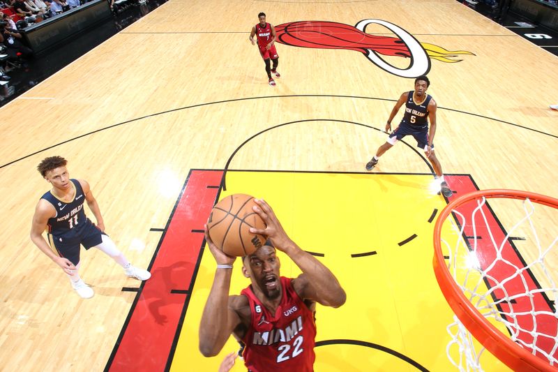 MIAMI, FL - JANUARY 22: Jimmy Butler #22 of the Miami Heat drives to the basket during the game against the New Orleans Pelicans on January 22, 2023 at Miami-Dade Arena in Miami, Florida. NOTE TO USER: User expressly acknowledges and agrees that, by downloading and or using this Photograph, user is consenting to the terms and conditions of the Getty Images License Agreement. Mandatory Copyright Notice: Copyright 2023 NBAE (Photo by Nathaniel S. Butler/NBAE via Getty Images)