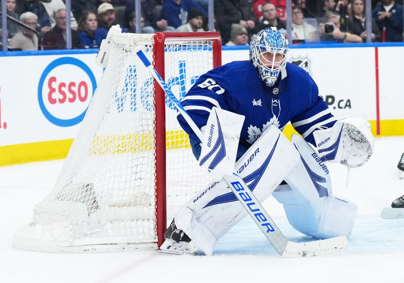 Dec 30, 2025; Toronto, Ontario, CAN; Toronto Maple Leafs goaltender Joseph Woll (60) follows the play against the New Jersey Devils during the second period at Scotiabank Arena. Mandatory Credit: Nick Turchiaro-Imagn Images