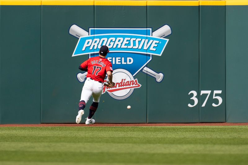 Apr 14, 2024; Cleveland, Ohio, USA; Cleveland Guardians outfielder Will Brennan (17) fields a fly ball to centerfield during the ninth inning by the New York Yankees at Progressive Field. Mandatory Credit: Scott Galvin-USA TODAY Sports